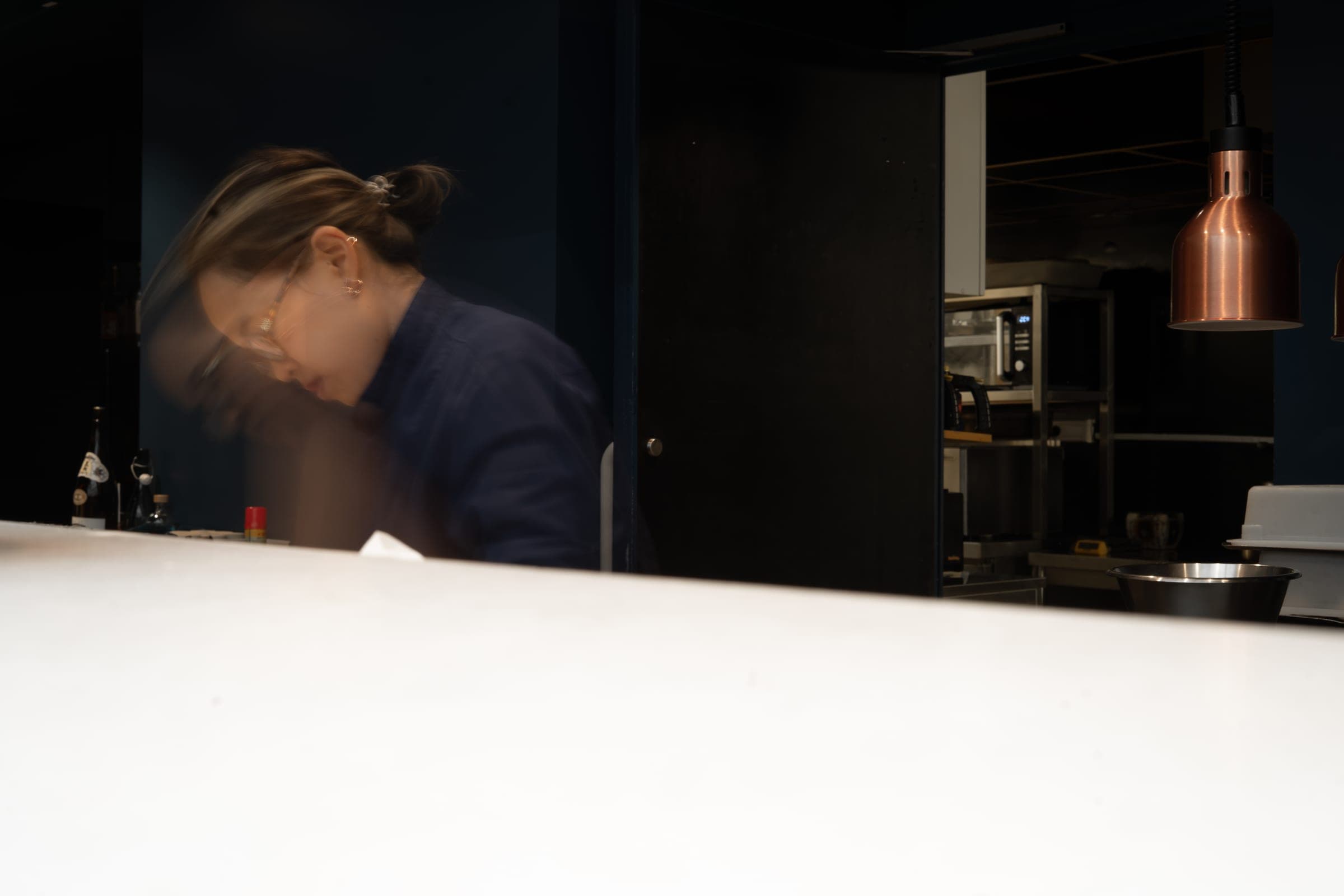 The team at full service in the kitchen of restaurant ERH